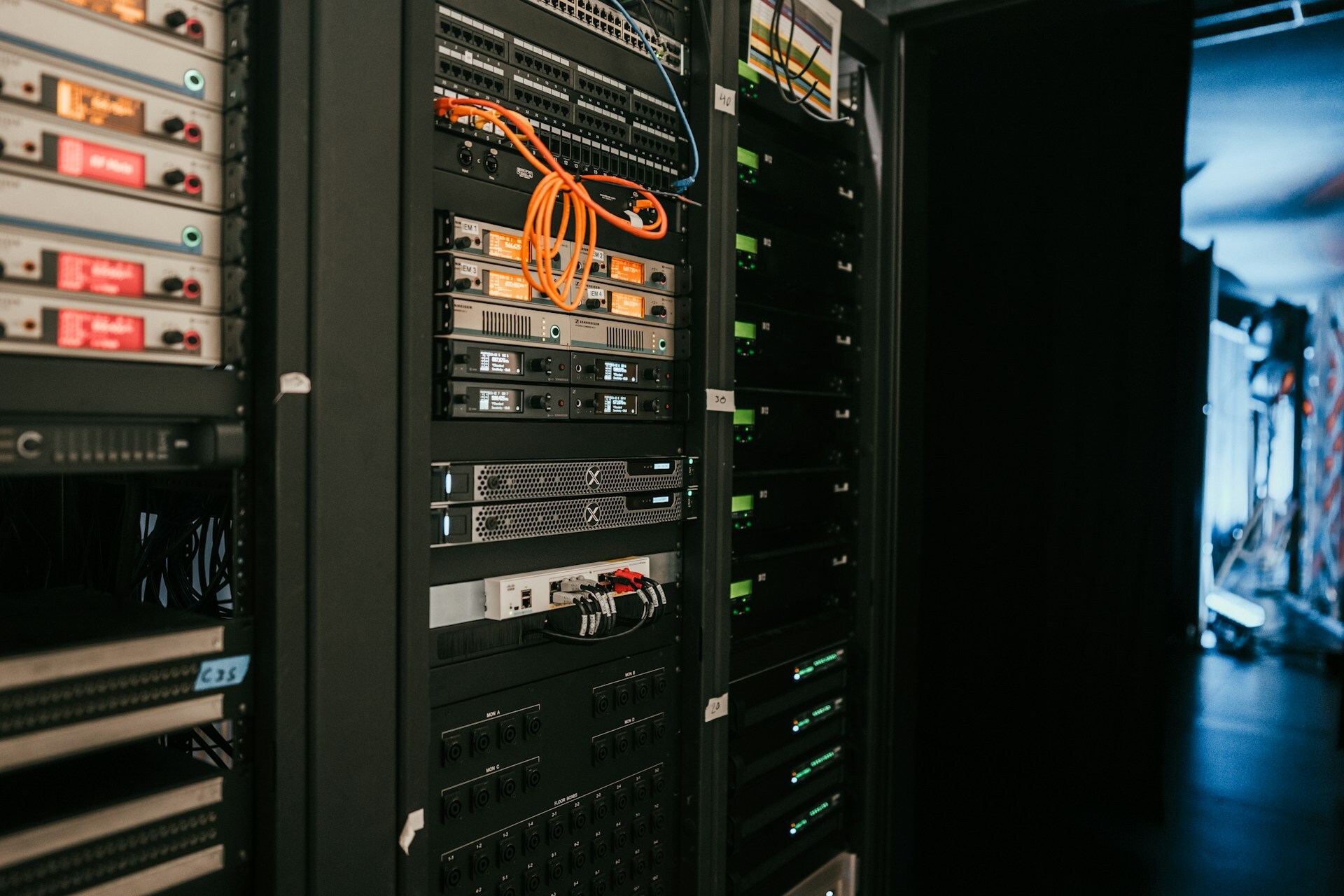 An image of several servers in a data centre